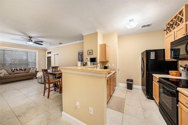 kitchen featuring kitchen peninsula, black appliances, crown molding, a textured ceiling, and ceiling fan