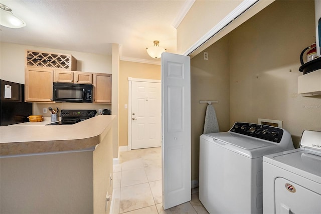 5000 Culbreath Key Way Unit 1-212, Tampa, FL 33611 - clothes washing area featuring independent washer and dryer, ornamental molding, light tile patterned floors, and baseboards