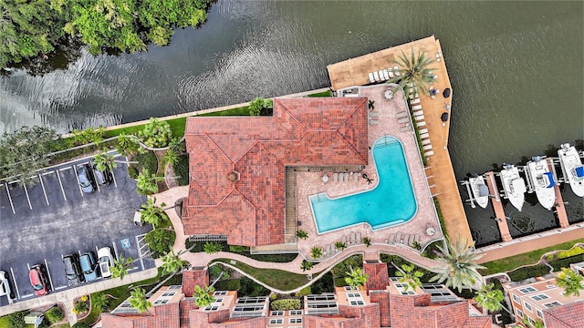 5000 Culbreath Key Way Unit 1-212, Tampa, FL 33611 - drone / aerial view of a nearby body of water and a pool area