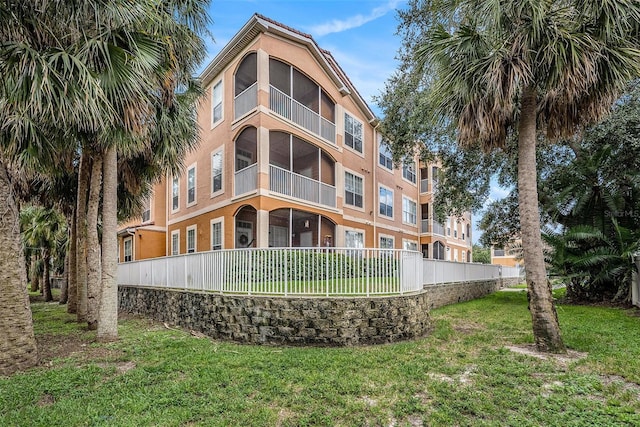 5000 Culbreath Key Way Unit 1-212, Tampa, FL 33611 - view of property featuring fence