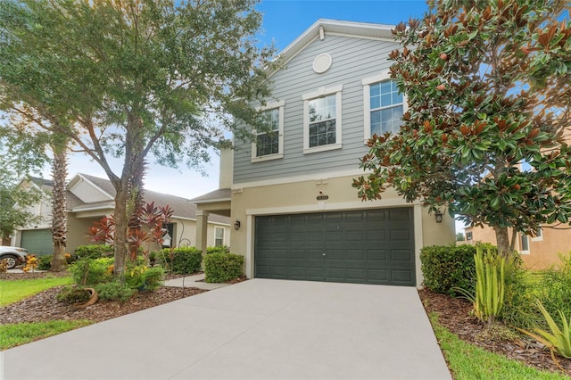 view of front of property with a garage