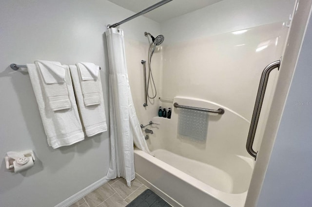 bathroom featuring shower / bath combo with shower curtain