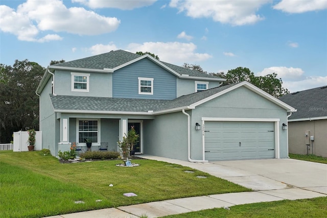 view of front of home with a garage, a porch, and a front lawn