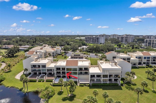 birds eye view of property featuring a water view