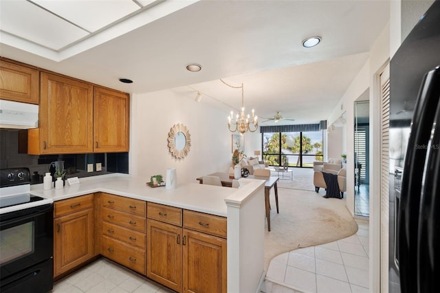 kitchen with exhaust hood, pendant lighting, black appliances, kitchen peninsula, and light colored carpet