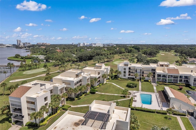 birds eye view of property with a water view