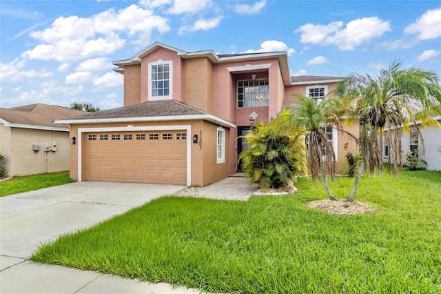 view of front of home with a garage and a front yard