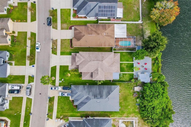 drone / aerial view with a water view