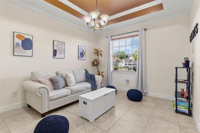 living room featuring a chandelier, a tray ceiling, light tile patterned floors, and crown molding