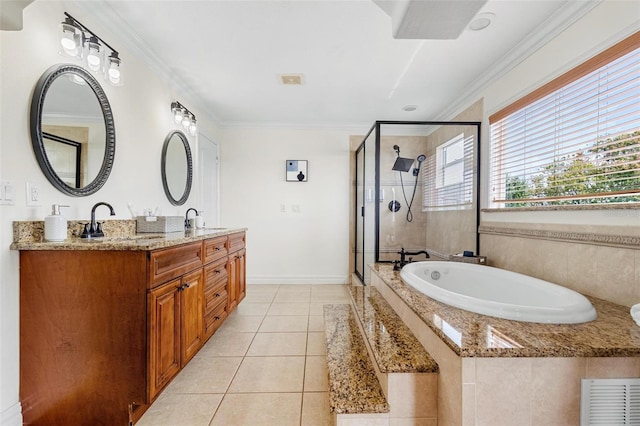 bathroom featuring ornamental molding, shower with separate bathtub, tile patterned floors, and vanity