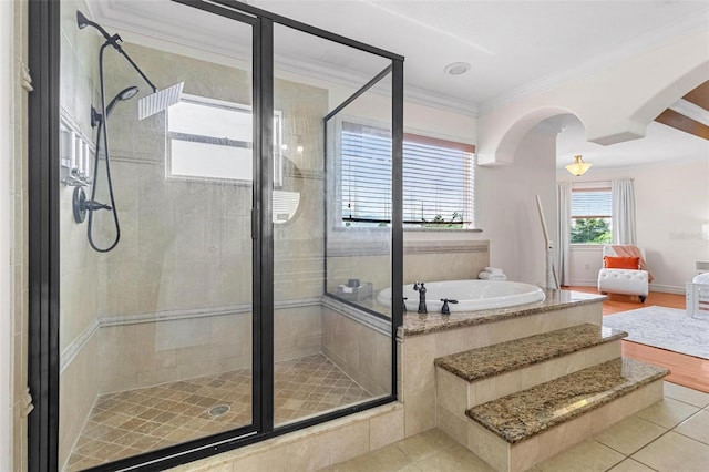 bathroom with shower with separate bathtub, crown molding, and tile patterned floors