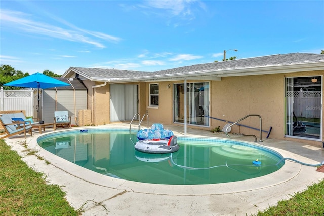 view of pool featuring a patio