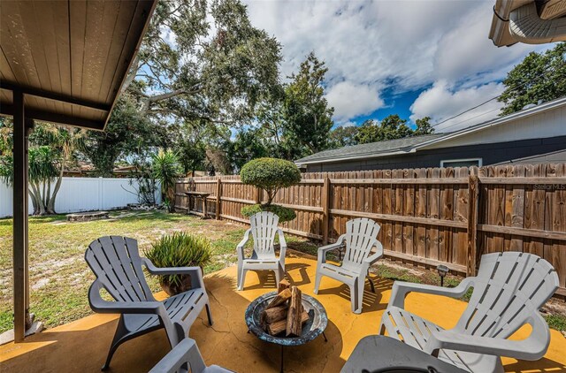 view of patio / terrace featuring a fire pit