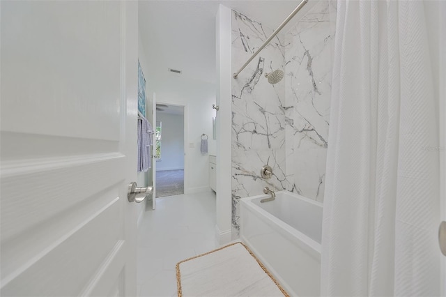 bathroom featuring shower / bath combo