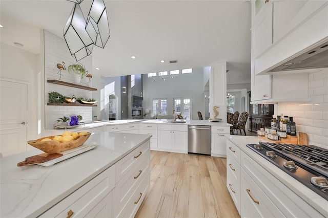 kitchen with custom exhaust hood, tasteful backsplash, white cabinets, black gas stovetop, and dishwasher