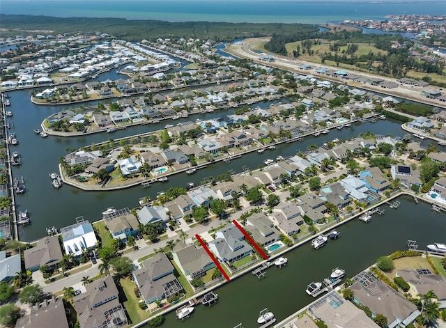 aerial view featuring a water view and a residential view