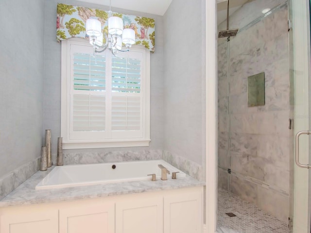 bathroom with separate shower and tub and a notable chandelier