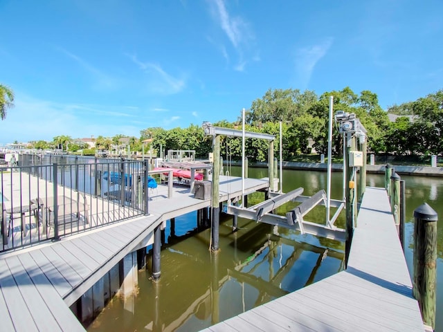 dock area featuring a water view