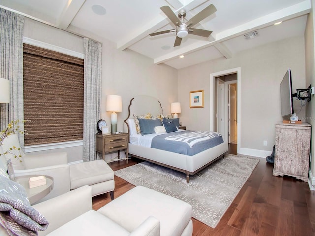 bedroom with ceiling fan, beam ceiling, and dark hardwood / wood-style floors