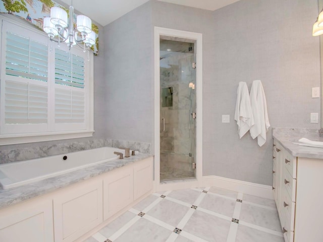 bathroom with a chandelier, shower with separate bathtub, vanity, and tile patterned flooring