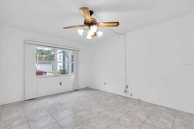 unfurnished room featuring ceiling fan