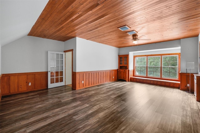 bonus room featuring dark hardwood / wood-style floors, vaulted ceiling, ceiling fan, and wooden ceiling