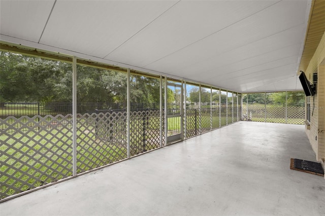 unfurnished sunroom featuring a healthy amount of sunlight