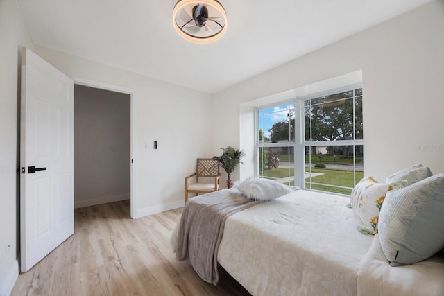 bedroom with light hardwood / wood-style flooring