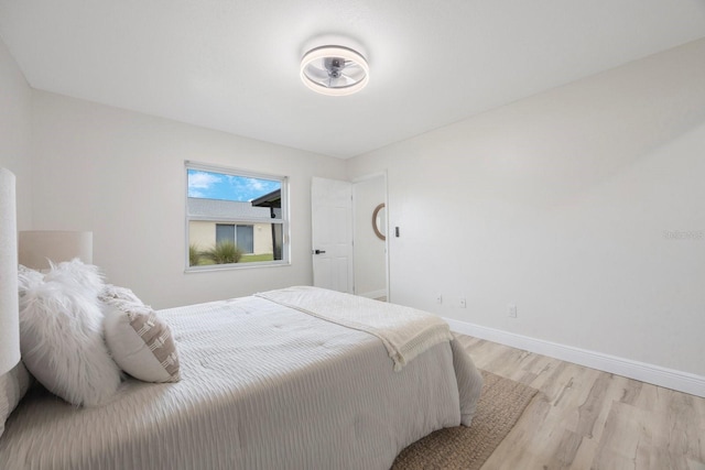 bedroom with light wood-type flooring