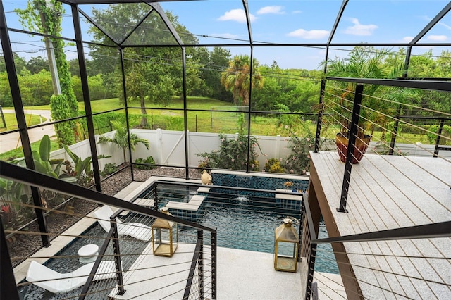 view of pool with a lanai