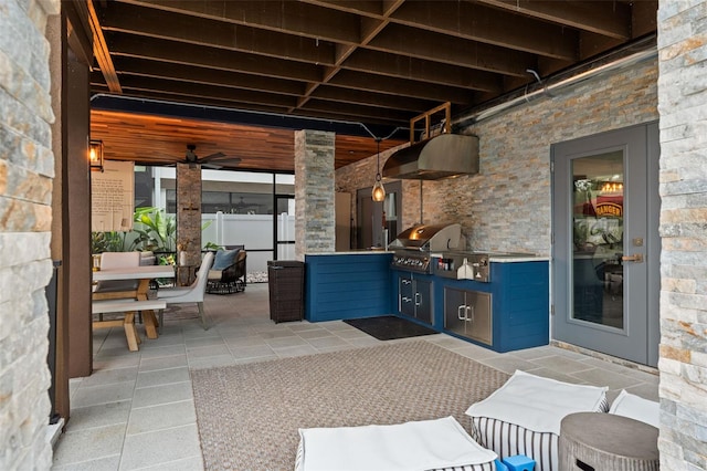 view of patio / terrace featuring exterior kitchen and grilling area