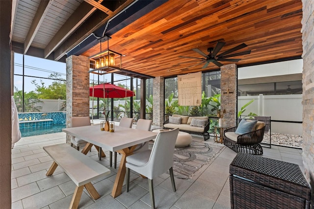 view of patio / terrace with an outdoor living space and ceiling fan