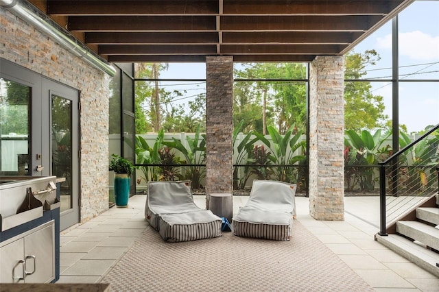 sunroom featuring plenty of natural light