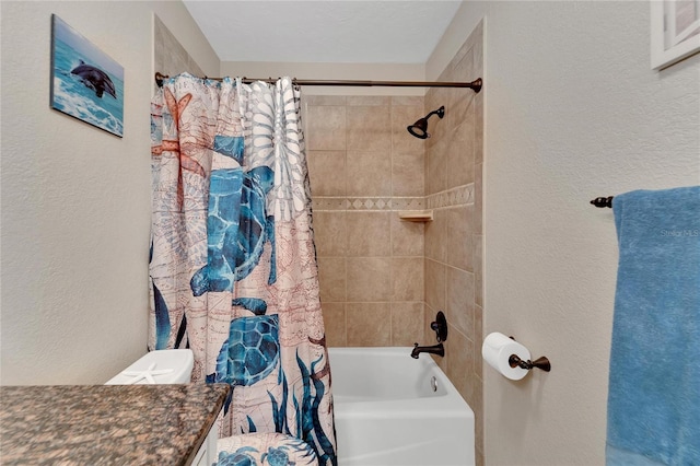 full bathroom with vanity, toilet, and shower / bath combination with curtain