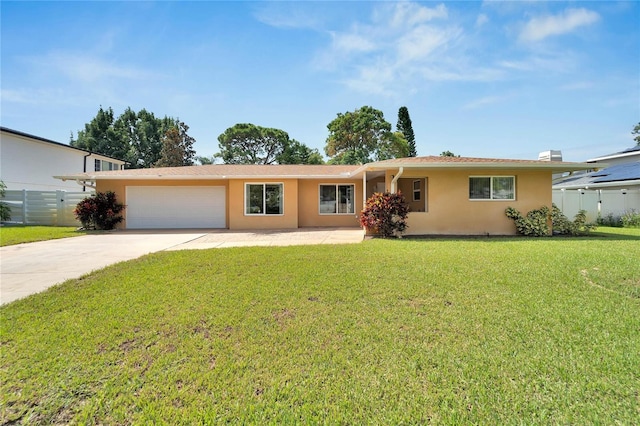 single story home with a front yard and a garage