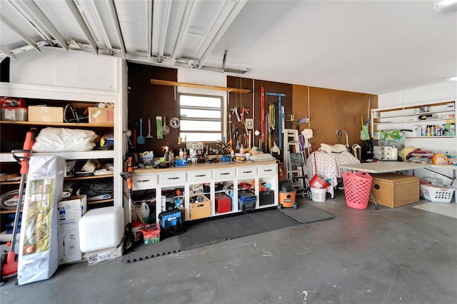 garage with a workshop area