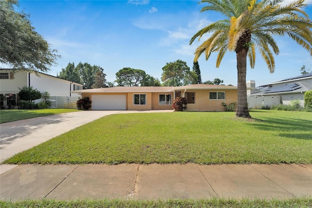 ranch-style home featuring a front yard