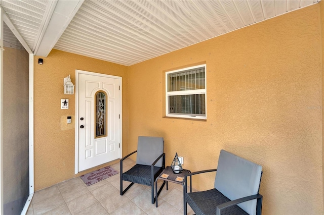 doorway to property featuring a patio