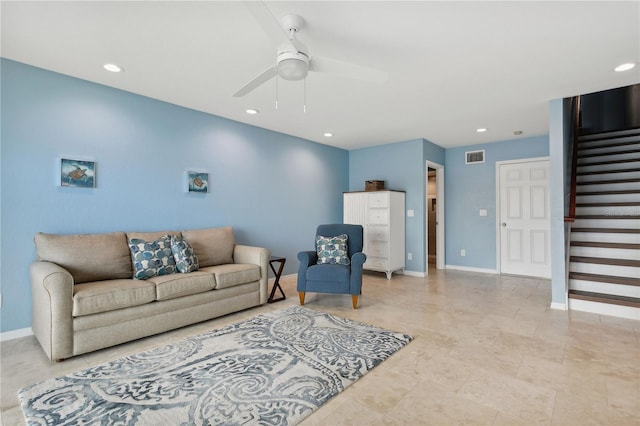 living room featuring ceiling fan