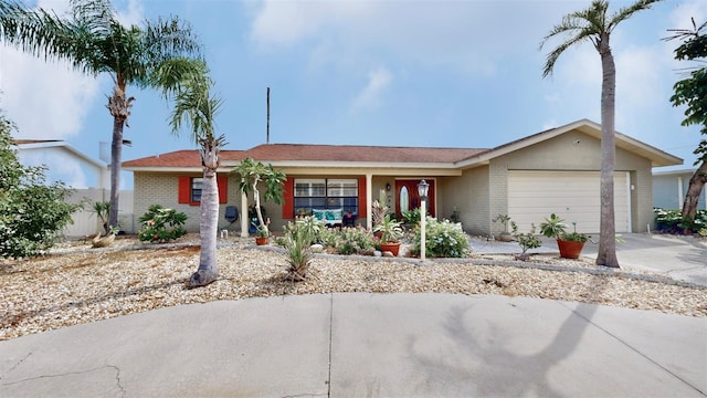 single story home featuring a garage