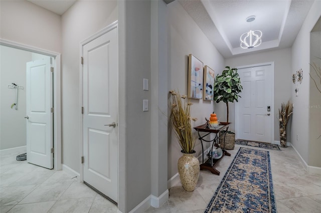 view of tiled foyer entrance