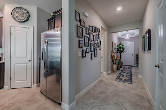 interior space featuring a textured ceiling