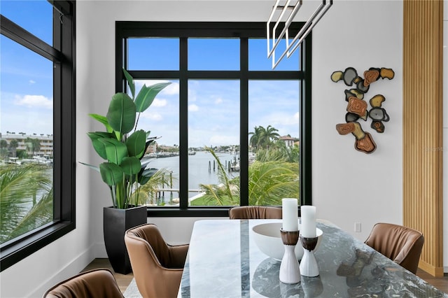 dining area featuring a water view