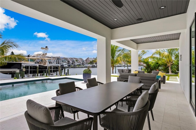 view of patio featuring a water view