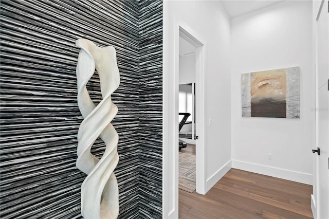 corridor featuring dark hardwood / wood-style flooring