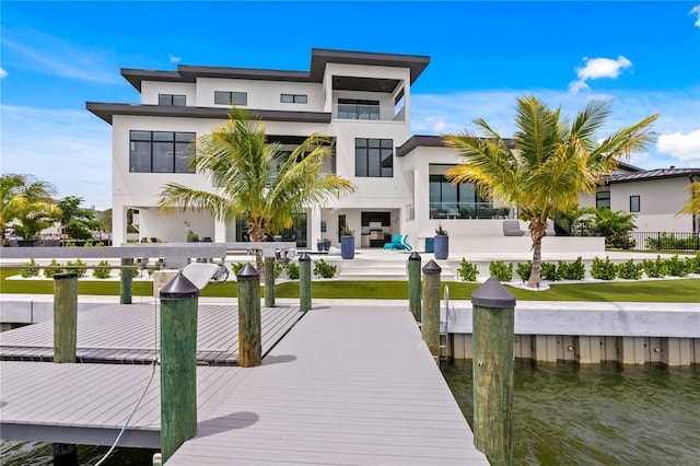 dock area with a water view