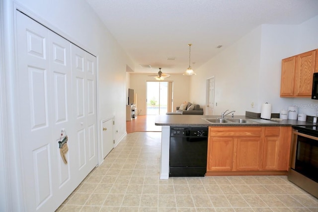 kitchen featuring ceiling fan, hanging light fixtures, sink, kitchen peninsula, and black appliances