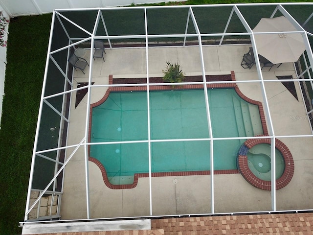 view of swimming pool featuring a patio