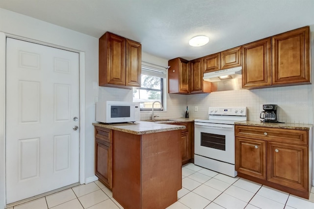 kitchen featuring sink, electric stove, decorative backsplash, and light stone countertops