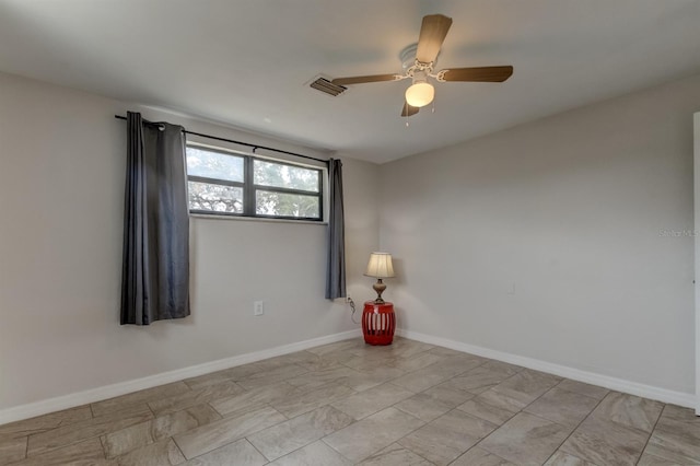 spare room featuring ceiling fan